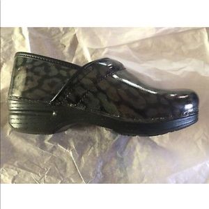 Dansko Iridescent Leopard Clogs